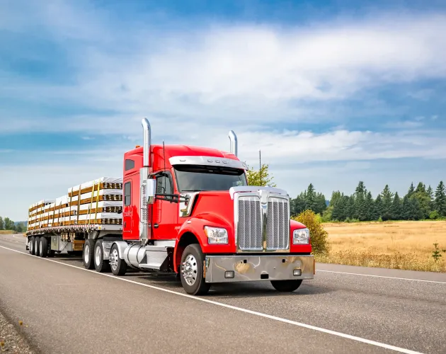 ACF specialized freight management truck transporting industrial equipment